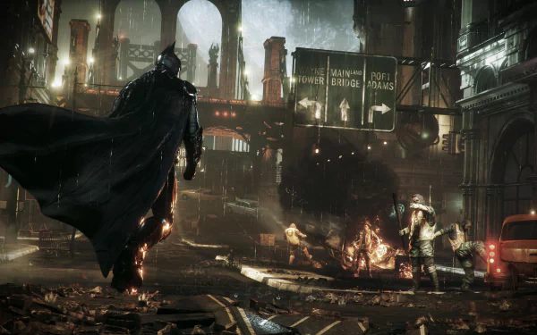 HD desktop wallpaper featuring Batman from the video game Batman: Arkham Knight, showing an intense urban scene at night with lit signs and debris.