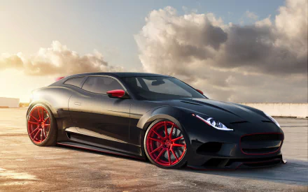 A sleek black Jaguar F-Type with striking red wheels, showcased against a scenic backdrop, serves as a stunning HD desktop wallpaper.