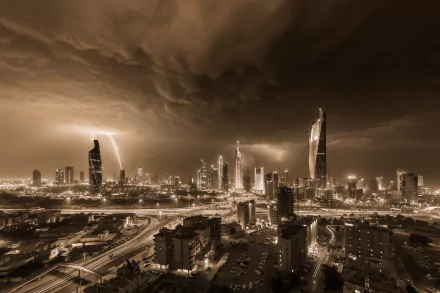 A dramatic view of Kuwait City illuminated by lightning, showcasing the stunning man-made skyline against a moody sky, creating a captivating urban scene.