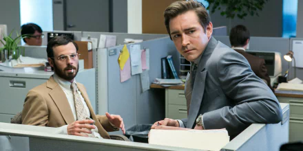 HD desktop wallpaper of characters from Halt And Catch Fire in an office setting, featuring actors associated with the roles of Joe MacMillan and Gordon Clark.