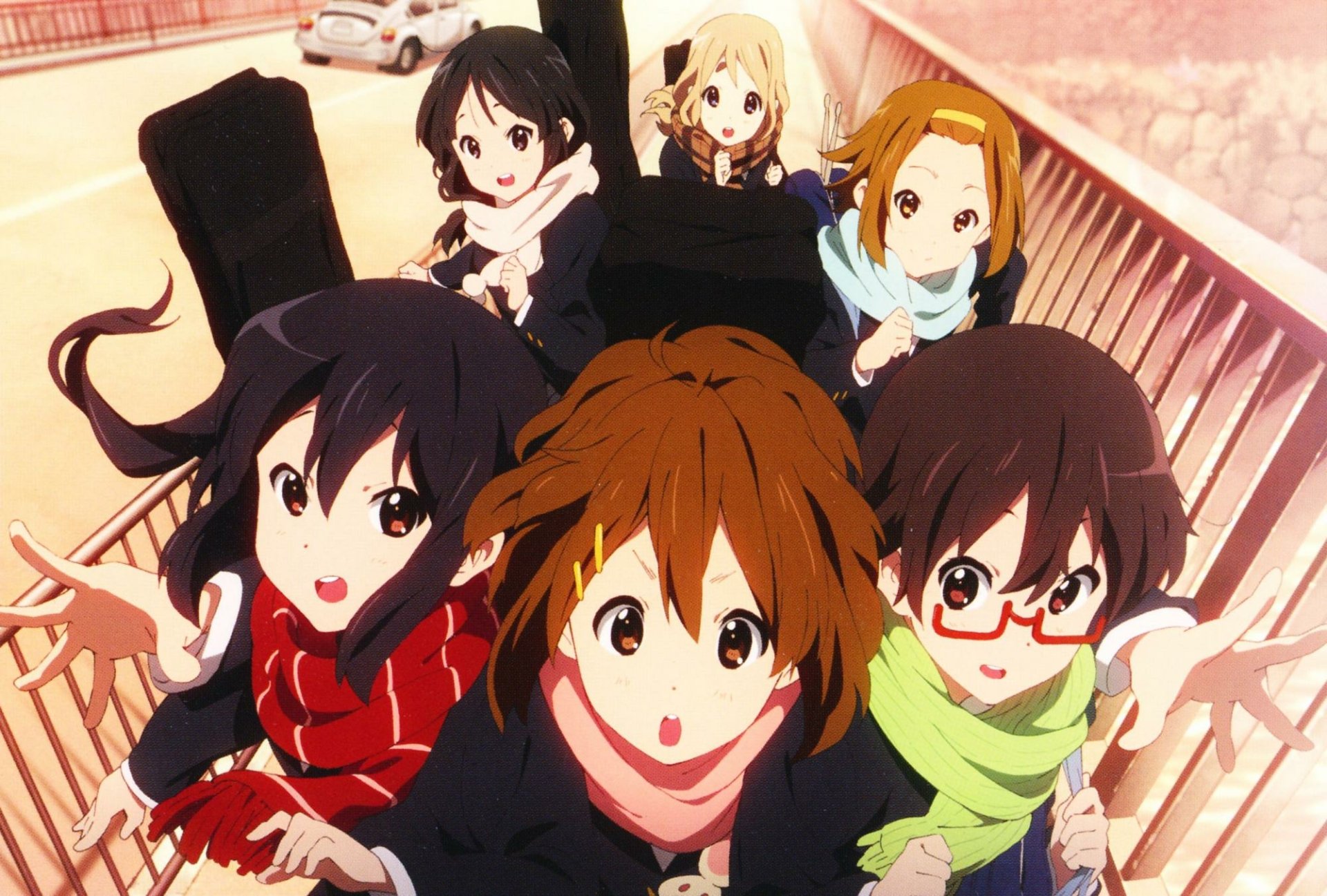 HD anime wallpaper featuring Nodoka Manabe, Azusa Nakano, Tsumugi Kotobuki, Ritsu Tainaka, Yui Hirasawa, and Mio Akiyama from K-ON! in a cozy winter setting.