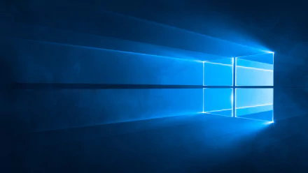 A vivid 4K Ultra HD desktop wallpaper featuring a sleek Windows 10 interface, illuminated by soft blue light and geometric shapes, creating a modern technological ambiance.