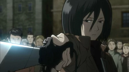 Mikasa Ackerman from Attack on Titan readies her weapon, exuding determination against a backdrop of gathered onlookers, creating a striking HD anime wallpaper.