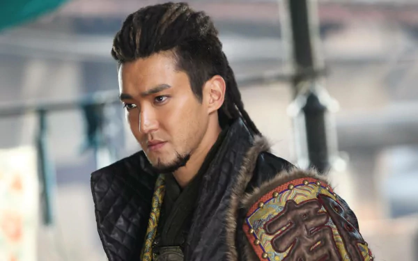 HD PC desktop wallpaper featuring a character from the movie Dragon Blade dressed in detailed warrior attire with an intense expression.