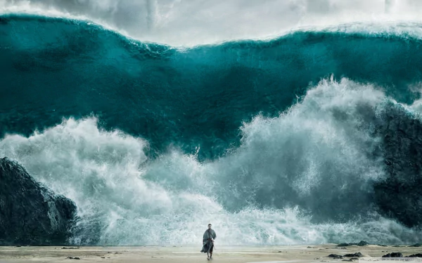 HD PC desktop wallpaper from the movie Exodus: Gods and Kings depicting a dramatic scene of the parted sea with a lone figure standing on the shore.