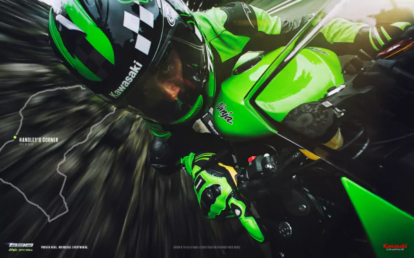 A dynamic HD wallpaper featuring a rider in green gear on a Kawasaki Ninja, capturing the thrill of speed on a winding road.