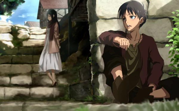 HD wallpaper of Mikasa Ackerman and Eren Yeager from the anime Attack on Titan. Eren sits against a stone wall looking pensive while Mikasa stands on a set of steps in the background.