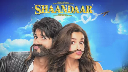 HD wallpaper featuring Alia Bhatt and Shahid Kapoor from the movie Shaandaar. The background is a bright, blue sky with the film’s title in golden letters at the top.