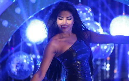 HD PC desktop wallpaper featuring Priyanka Chopra in a glamorous scene from the movie Shootout at Wadala, with vibrant blue lighting and reflective disco balls.