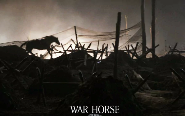 HD PC desktop wallpaper from the movie War Horse, featuring a silhouette of a galloping horse amid a wartime battlefield scene with broken fences and debris.