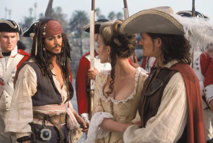 HD desktop wallpaper featuring Johnny Depp as Jack Sparrow, Orlando Bloom as Will Turner, and Keira Knightley as Elizabeth Swann from Pirates of the Caribbean: The Curse of the Black Pearl.