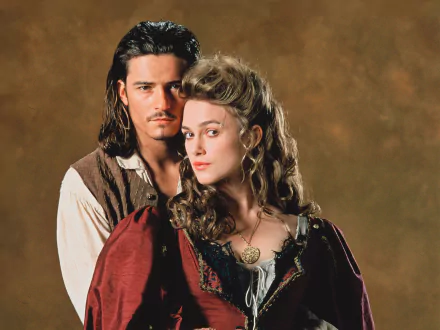 HD desktop wallpaper featuring Will Turner (Orlando Bloom) and Elizabeth Swann (Keira Knightley) from the movie Pirates of the Caribbean: The Curse of the Black Pearl.