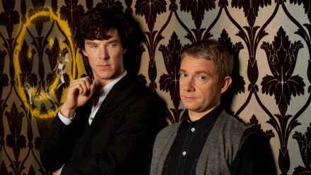 A striking HD wallpaper from the TV show Sherlock, featuring the iconic characters posed against an ornate, patterned wall, capturing their intriguing personalities and dynamic.