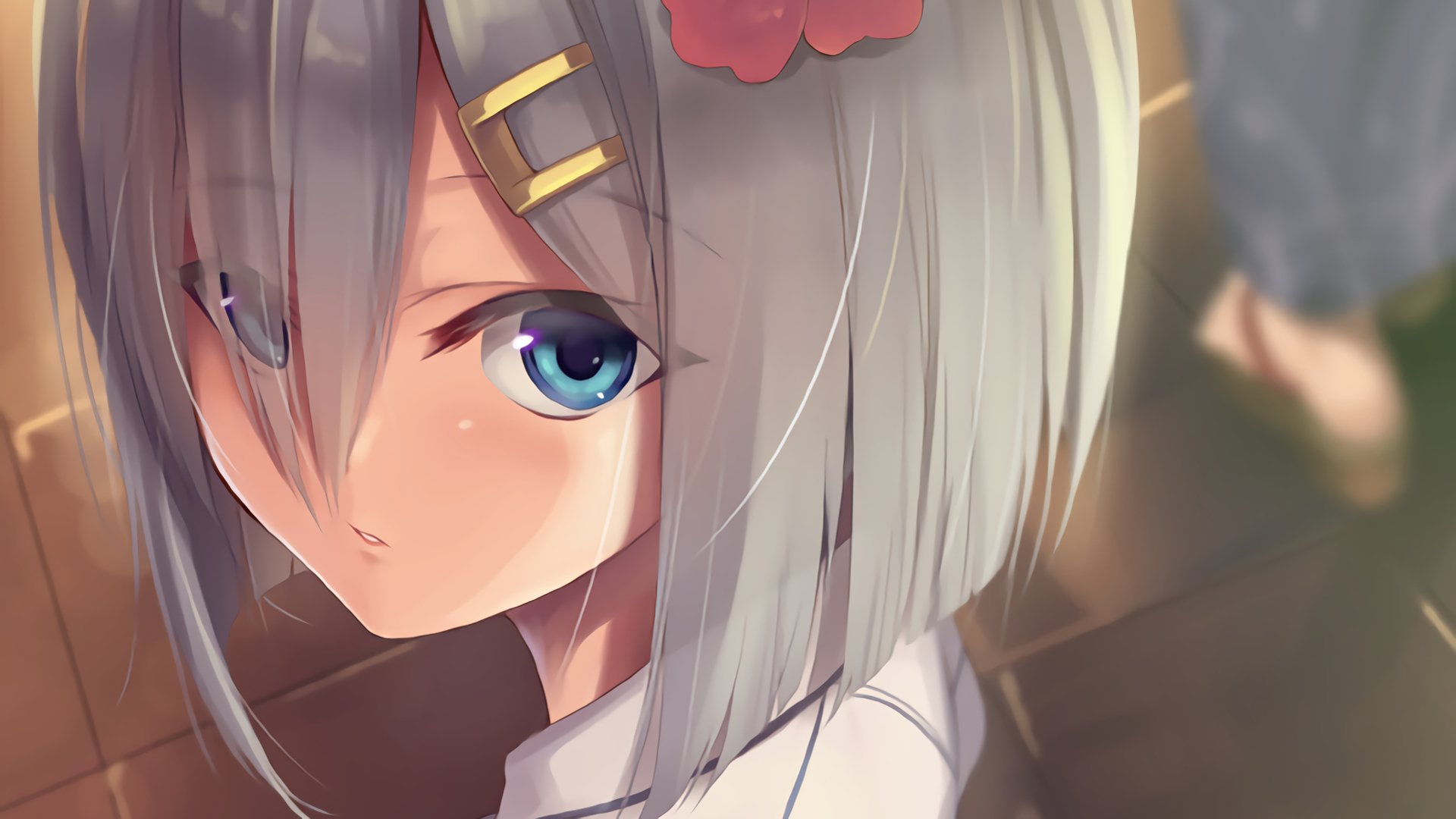 A close-up of an anime character with silver hair and blue eyes, featuring a flower accessory. This HD wallpaper captures elements from Kantai Collection.
