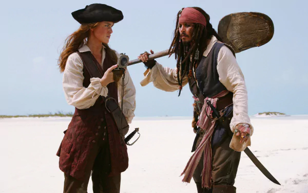 Elizabeth Swann and Jack Sparrow share a moment on a beach in this HD desktop wallpaper from *Pirates of the Caribbean: Dead Man's Chest*, featuring Keira Knightley and Johnny Depp.