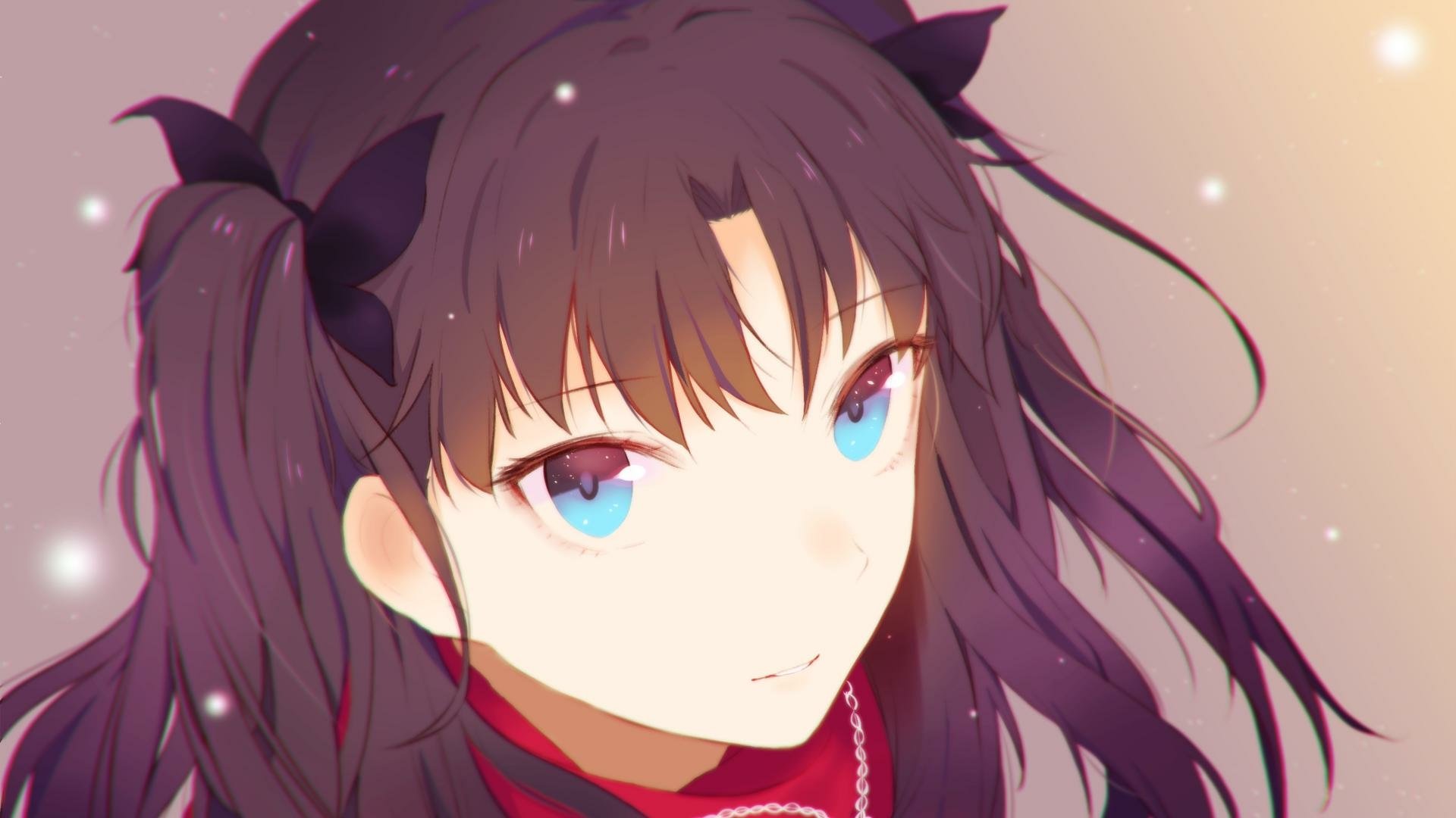HD anime desktop wallpaper featuring Rin Tohsaka from Fate/Stay Night with flowing dark hair and vibrant blue eyes against a soft, glowing background.