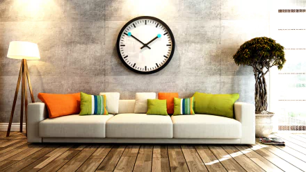 HD desktop wallpaper of a modern room interior featuring a beige sofa with colorful pillows, a large wall clock, wooden floor, floor lamp, and potted tree.