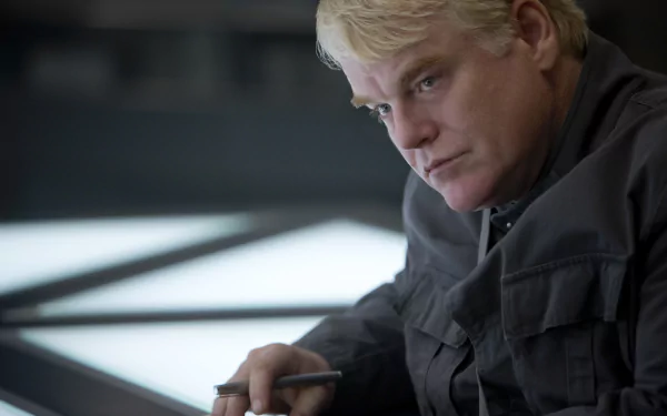 Plutarch Heavensbee Philip Seymour Hoffman movie The Hunger Games: Mockingjay - Part 1 HD Desktop Wallpaper | Background Image
