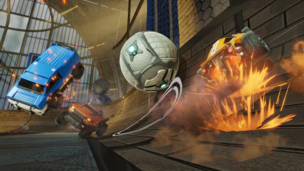 An action-packed HD wallpaper featuring explosive gameplay from Rocket League, showcasing cars flying towards a soccer ball in an intense arena setting.