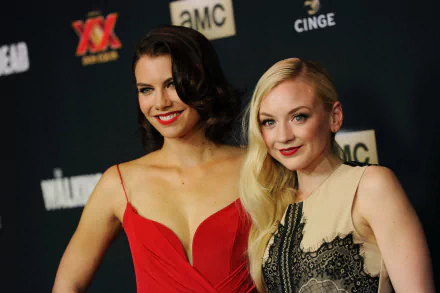 Lauren Cohan and Emily Kinney pose together at a red carpet event, showcasing their stylish outfits and vibrant smiles. This 4K Ultra HD wallpaper captures their celebrity essence.