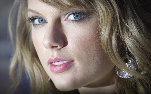 Music Taylor Swift American Singer Blonde Close-Up Face Blue Eyes Lipstick Earrings HD Wallpaper | Background Image