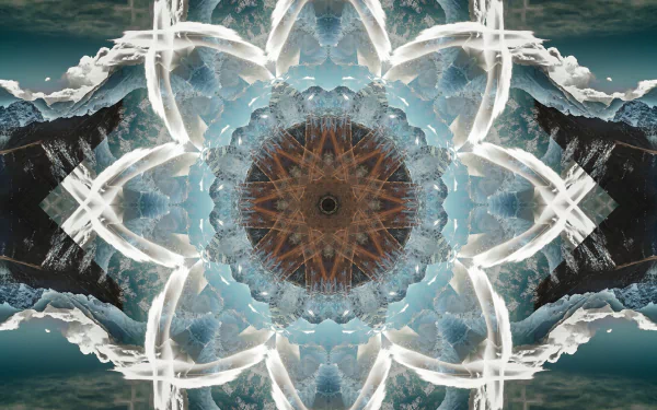 Abstract artistic mandala HD PC desktop wallpaper — radial kaleidoscope of icy blues and whites with a warm brown center set against mirrored mountain and cloud textures.