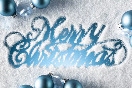 A HD desktop wallpaper featuring blue Christmas ornaments and the phrase Merry Christmas written in snow, capturing a festive holiday spirit.