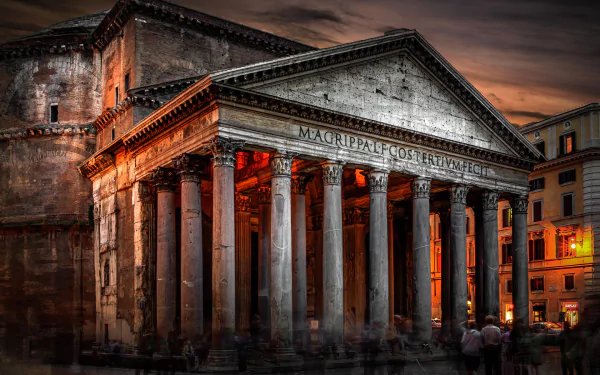 A stunning time-lapse image of the Pantheon in Rome, showcasing its grand architecture with illuminated columns against a dramatic evening sky. Perfect for a HD desktop background.