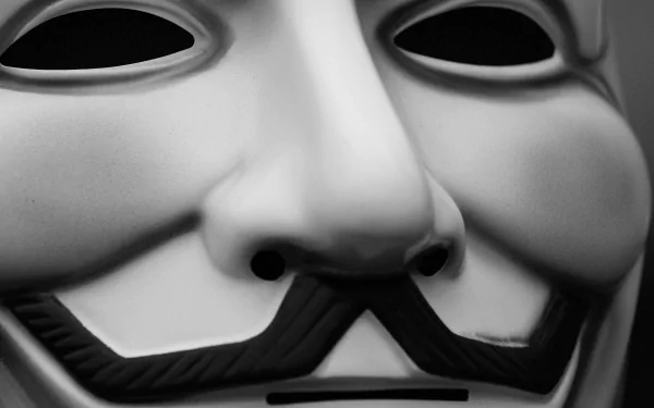 HD desktop wallpaper of a close-up view of an anonymous mask, symbolizing technology and anonymity.