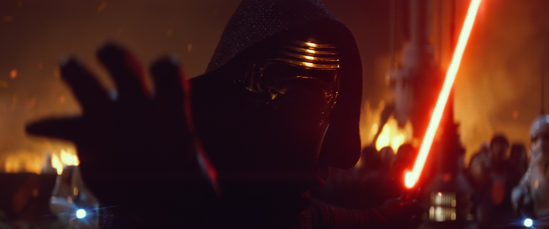 Kylo Ren from Star Wars: Episode VII - The Force Awakens, featuring his iconic mask and red lightsaber, set against a dramatic backdrop, is displayed as a high-definition desktop wallpaper.
