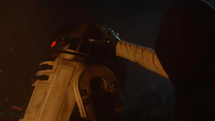 A scene from Star Wars Episode VII: The Force Awakens, featuring R2-D2 with a hand reaching toward it, set against a dramatic, dark background. HD desktop wallpaper.