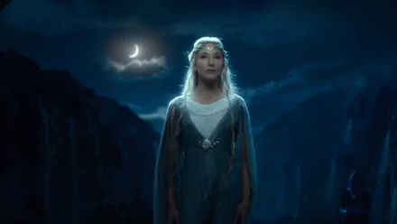 A stunning HD wallpaper featuring a character from *The Hobbit: An Unexpected Journey*, standing under a crescent moon amidst a mystical landscape.
