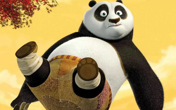 HD desktop wallpaper featuring Po from the Kung Fu Panda movie in an action pose with a warm, yellow sky and autumn leaves in the background.