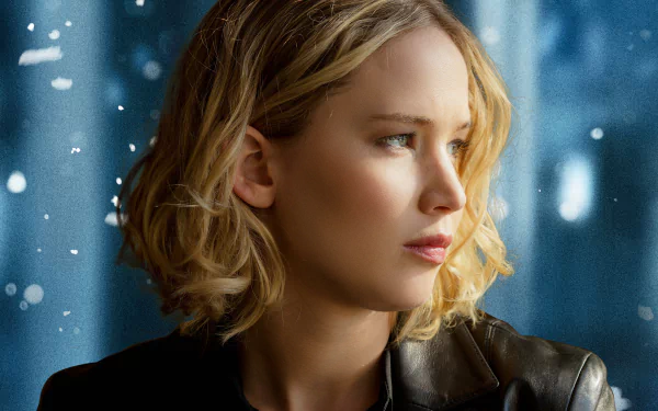 Close-up 4K Ultra HD PC wallpaper of Jennifer Lawrence from the movie Joy (2015), featuring her looking thoughtfully to the side against a blurred snowy background.