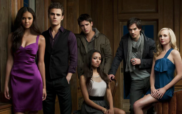 HD desktop wallpaper featuring the main cast of The Vampire Diaries, showcasing six characters in a dramatic and stylish setting.