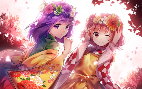 Two characters from Touhou, Kosuzu Motoori and Hieda no Akyuu, pose playfully amid floral backgrounds, adorned in vibrant Japanese outfits. One character winks, showcasing pink hair and a flower headdress.