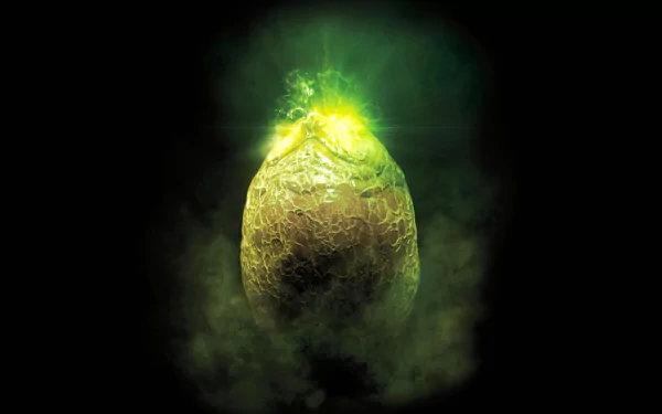 HD PC desktop wallpaper featuring a glowing alien egg emitting green light and mist, inspired by a classic sci-fi movie theme.