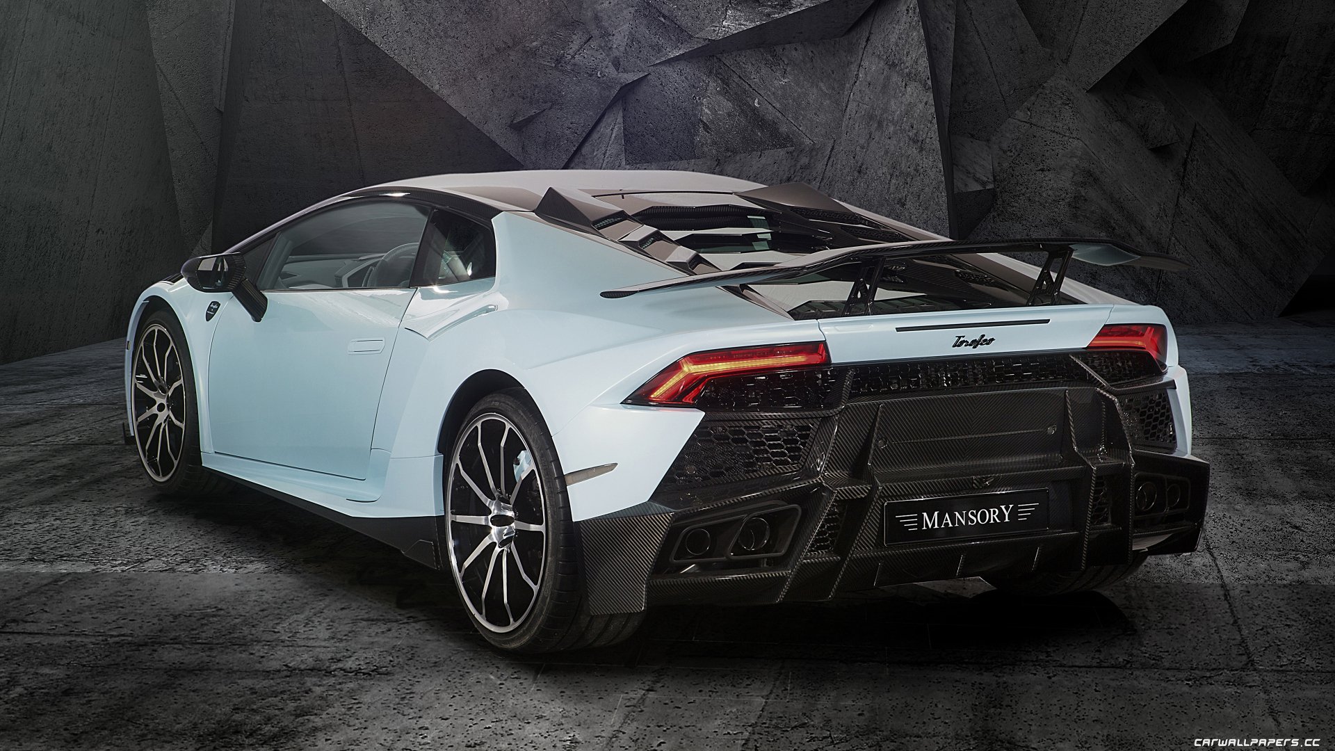 Sleek white Lamborghini Huracan with Mansory tuning showcased in a high-resolution 4K Ultra HD desktop wallpaper.