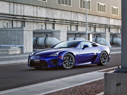 HD desktop wallpaper featuring a sleek blue Lexus LFA supercar parked on an urban street, showcasing its aerodynamic design and sporty appeal.