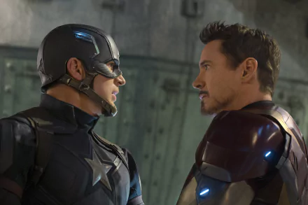 HD wallpaper featuring Captain America (Chris Evans) and Iron Man (Robert Downey Jr.) staring intensely at each other from the movie Captain America: Civil War.