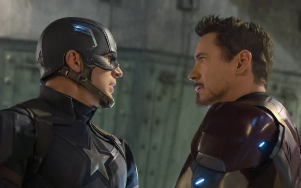 HD wallpaper featuring Captain America (Chris Evans) and Iron Man (Robert Downey Jr.) staring intensely at each other from the movie Captain America: Civil War.