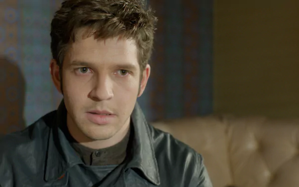 HD PC desktop wallpaper featuring Hal Yorke from the TV show Being Human, showing him in a dimly lit indoor setting with a serious expression.