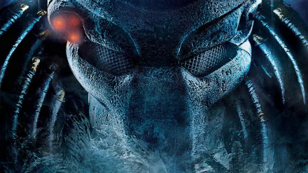 HD desktop wallpaper and background from the movie Predator, featuring a close-up of the Predator's menacing face in dark, atmospheric colors.