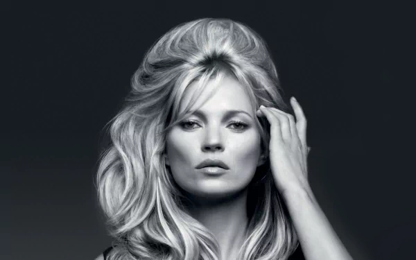 Black-and-white close-up of a female fashion model's face, voluminous hair and hand to temple — high-definition PC desktop wallpaper/background.