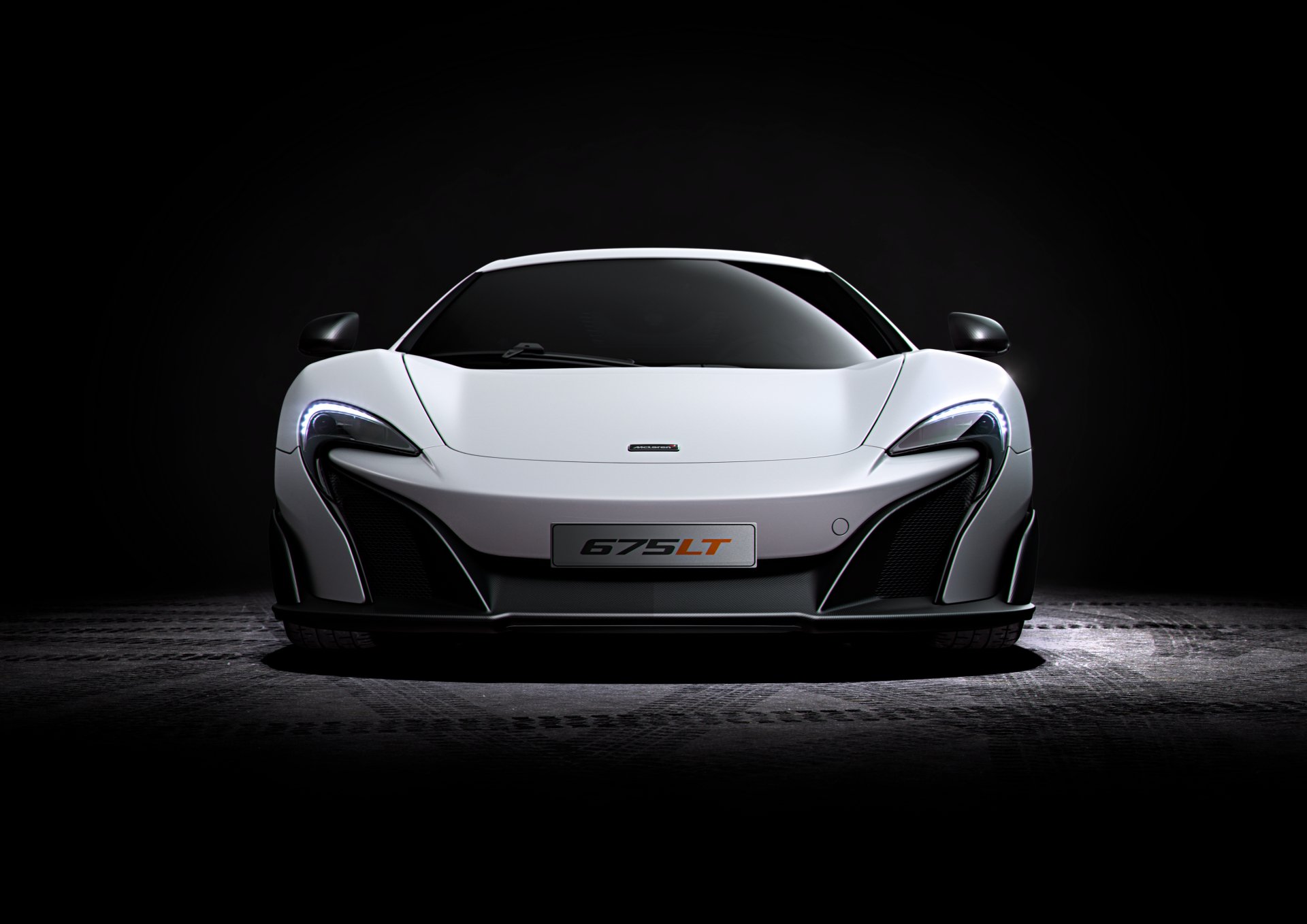 Front view of a white McLaren 675LT supercar on a dark background, 4K Ultra HD PC desktop wallpaper.