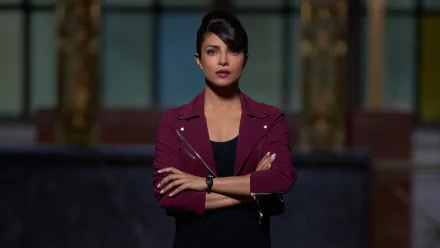 HD desktop wallpaper featuring Priyanka Chopra from the TV show Quantico, with a confident pose and dark, dramatic background.