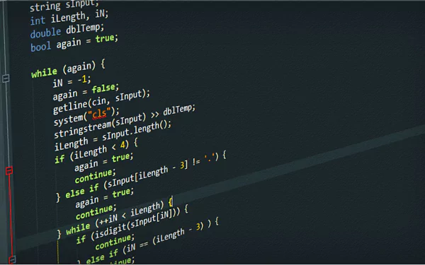 A close-up view of programming code on a dark background, showcasing technology and coding elements. This HD wallpaper captures the essence of programming with a sleek aesthetic.