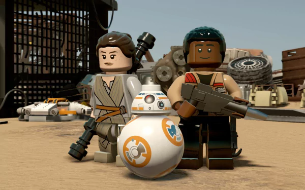 HD wallpaper featuring LEGO characters Rey, Finn, and BB-8 from Star Wars: The Force Awakens, set as a desktop background.
