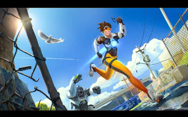 Action-packed HD wallpaper featuring Winston and Tracer from Overwatch, with Tracer sprinting energetically under a bright blue sky in a vibrant urban setting.