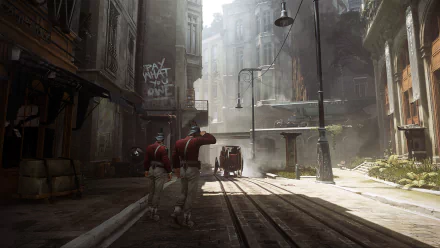 Dishonored 2 video game 2K Quad HD PC wallpaper: sunlit, foggy Victorian street with tram tracks, two guards and a horse-drawn carriage between towering, weathered buildings.